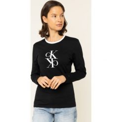 Bluzka Calvin Klein Jeans J20J213067. Białe bluzki damskie Calvin Klein Jeans, s, bez wzorów, z bawełny, bez kołnierzyka, bez rękawów. W wyprzedaży za 179,00 zł.