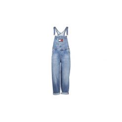 Kombinezony Tommy Jeans TJW REGULAR DUNGAREE PRKLR. Niebieskie kombinezony damskie Tommy Jeans, m, bez wzorów, z jeansu, bez kołnierzyka, bez rękawów. Za 479,20 zł.