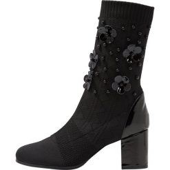 Tosca Blu TROMSO Botki nero. Czarne botki damskie marki Tosca Blu, ze skóry, klasyczne, bez obcasa, bez zapięcia. Za 539,00 zł.