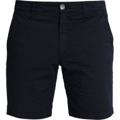 HUEZ QUATTRE SHORT Krótkie spodenki sportowe navy. Niebieskie spodenki i szorty męskie HUEZ, s, bez wzorów, z elastanu, sportowe. Za 409,00 zł.
