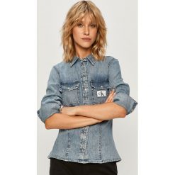 Calvin Klein Jeans - Koszula jeansowa. Niebieskie bluzki damskie Calvin Klein Jeans, s, z aplikacjami, z bawełny, klasyczne, z klasycznym kołnierzykiem, z długim rękawem. Za 399,90 zł.