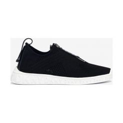 DKNY Melissa Tenisówki Czarny. Czarne trampki i tenisówki damskie DKNY, bez wzorów, z materiału, bez zapięcia. Za 481,95 zł.