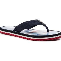 Japonki TOMMY HILFIGER - Flat Beach Sandal Madras Print FW0FW04032 RWB 020. Niebieskie klapki damskie TOMMY HILFIGER, bez wzorów, ze skóry, bez obcasa. W wyprzedaży za 129,00 zł.