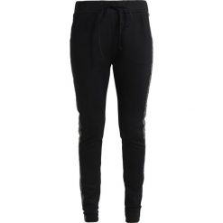 Spodnie dresowe damskie: Circle of Trust ROBYN JOGG Spodnie treningowe cheetah