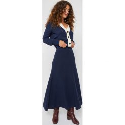 Spódnica w kolorze granatowym. Niebieskie spódniczki damskie Rodier, xl, z wełny, klasyczne, z podwyższonym stanem, midi, asymetryczne. W wyprzedaży za 189,95 zł.