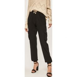 Answear - Spodnie. Czarne legginsy damskie ANSWEAR, s, bez wzorów, z elastanu. W wyprzedaży za 79,90 zł.