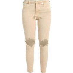 Free People BUSTED Jeans Skinny Fit beige. Brązowe rurki damskie marki Free People, z elastanu. Za 349,00 zł.