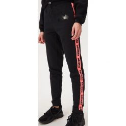 Spodnie jogger Batman - Czarny. Czarne spodnie damskie Sinsay, s. Za 59,99 zł.
