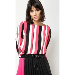 Koralowa Bluzka Acrobat. Pomarańczowe bluzki longsleeves other, uniwersalny. Za 69,99 zł.