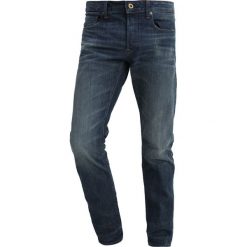 GStar 3301 SLIM Jeansy Slim Fit higa denim. Niebieskie jeansy męskie relaxed fit marki G-Star. W wyprzedaży za 475,15 zł.