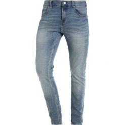 Cheap Monday TIGHT Jeansy Slim Fit wasteland. Niebieskie rurki męskie marki Cheap Monday. W wyprzedaży za 199,20 zł.