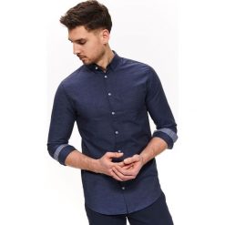 Koszula oxford o regularnym kroju. Koszule męskie Top Secret, na lato, m, bez wzorów, z tkaniny, klasyczne, z klasycznym kołnierzykiem, bez rękawów. W wyprzedaży za 49,99 zł.