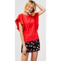 Bluzka bawełniana z falbanami. Bluzki damskie Moodo, s, z bawełny. Za 24,99 zł.