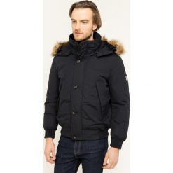 Kurtka puchowa TOMMY HILFIGER Hampton MW0MW11502. Zielone kurtki męskie TOMMY HILFIGER, m, bez wzorów, z bawełny, bez kaptura. W wyprzedaży za 799,00 zł.