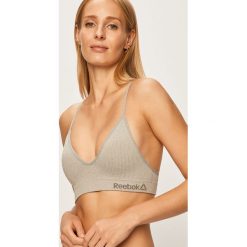 Reebok - Biustonosz. Czarne biustonosze sportowe damskie Reebok, s, bez wzorów, z elastanu. Za 99,90 zł.