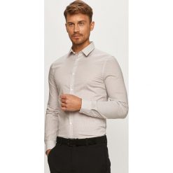 Marciano Guess - Koszula. Niebieskie koszule męskie MARCIANO GUESS, z aplikacjami, z elastanu, klasyczne, z klasycznym kołnierzykiem, z długim rękawem. Za 469,90 zł.