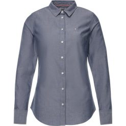Koszula Tommy Jeans DW0DW06820. Niebieskie bluzki damskie Tommy Jeans, xs, bez wzorów, z bawełny, bez kołnierzyka, bez rękawów. W wyprzedaży za 249,00 zł.