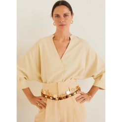 Mango - Bluzka Caramelo. Pomarańczowe bluzki damskie Mango, s, bez wzorów, z poliesteru, eleganckie, bez kołnierzyka, bez rękawów. W wyprzedaży za 79,90 zł.