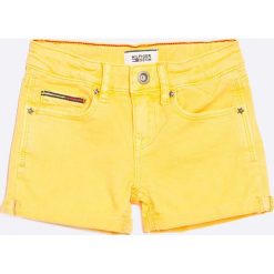 Tommy Hilfiger - Szorty dziecięce Nora 116-64 cm. Żółte spodenki dziewczęce marki TOMMY HILFIGER, z elastanu, casualowe. W wyprzedaży za 119,90 zł.