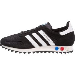 Adidas Originals LA TRAINER Tenisówki i Trampki core black/footwear white/vintage white. Czarne tenisówki damskie marki adidas Originals, z materiału. W wyprzedaży za 359,20 zł.