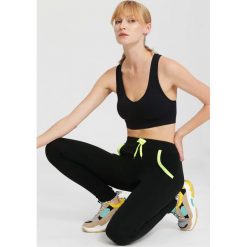 Czarne Legginsy Secure. Czarne legginsy marki other, l. Za 29,99 zł.