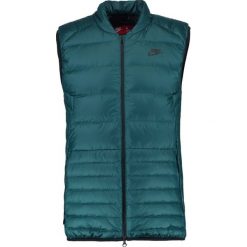 Nike Sportswear Kamizelka dark atomic teal/black. Zielone marynarki męskie Nike Sportswear, m, bez wzorów, z poliesteru. W wyprzedaży za 407,20 zł.