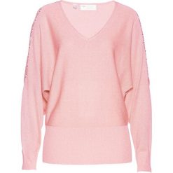 Sweter z wycięciami bonprix pastelowy jasnoróżowy - kolor czerwonego złota. Różowe swetry damskie bonprix, bez wzorów, bez rękawów, bez kaptura. Za 129,99 zł.