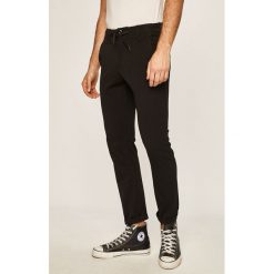 G-Star Raw - Spodnie. Czarne spodnie męskie z elastanu, retro. W wyprzedaży za 359,90 zł.