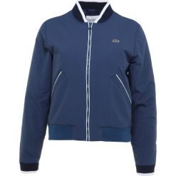 Lacoste Sport BOMBER JACKET Kurtka Outdoor inkwell/white/navy blue. Niebieskie kurtki damskie softshell Lacoste Sport, z materiału, outdoorowe. Za 1049,00 zł.