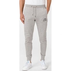 Tommy Hilfiger Spodnie dresowe Szary. Szare spodnie męskie TOMMY HILFIGER, xxl, z haftami, z bawełny. Za 514,95 zł.