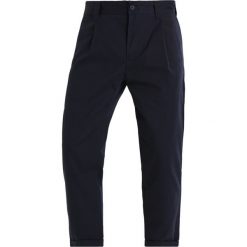 Chinosy męskie: Carhartt WIP TAYLOR BENSON Chinosy dark navy rigid