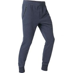 Spodnie skinny dresowe Gym & Pilates 500. Niebieskie spodnie męskie NYAMBA, l, bez wzorów, z elastanu. Za 69,99 zł.