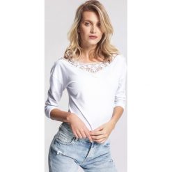 Biała Bluzka Ruthless. Białe bluzki damskie other, xl, bez wzorów, bez kołnierzyka, bez rękawów. Za 39,99 zł.