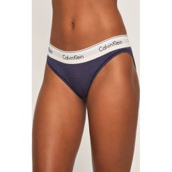 Calvin Klein Underwear - Stringi. Niebieskie majtki damskie Calvin Klein Underwear, s, z elastanu. Za 79,90 zł.