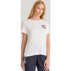 T-SHIRT ARRICIO FIANCHI Aeronautica Militare. Białe t-shirty damskie Aeronautica Militare, s, z aplikacjami, z elastanu, z okrągłym kołnierzem. Za 439,00 zł.