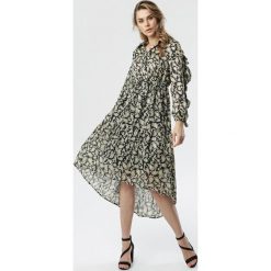 Czarna Sukienka Danni. Czarne sukienki damskie Born2be, na co dzień, s, bez wzorów, eleganckie, z falbankami, z długim rękawem, długie, midi, asymetryczne. Za 119,99 zł.