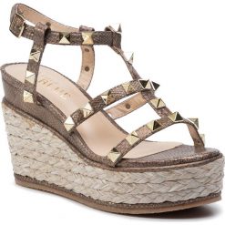 Espadryle ALMA EN PENA - V19BL108 Galaxy Bronze. Pomarańczowe espadryle damskie Alma en Pena, z aplikacjami, ze skóry ekologicznej, bez obcasa, na obcasie. W wyprzedaży za 209,00 zł.