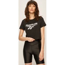 Reebok Classic - T-shirt. Czarne topy damskie Reebok Classic, s, z nadrukiem, z elastanu, z okrągłym kołnierzem. Za 79,90 zł.