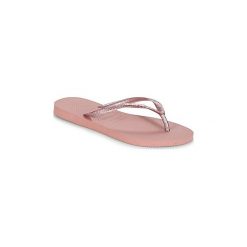 Japonki Havaianas SLIM LOGO METALLIC. Różowe klapki damskie Havaianas, bez wzorów, bez obcasa. Za 90,30 zł.