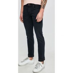 Tommy Hilfiger - Jeansy Denton. Niebieskie jeansy męskie TOMMY HILFIGER, bez wzorów, z obniżonym stanem. W wyprzedaży za 459,90 zł.