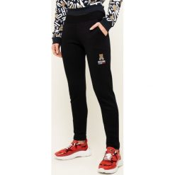 Spodnie dresowe Moschino Underwear & Swim A4329 9026. Szare spodnie damskie Moschino Underwear & Swim, xs, z elastanu. W wyprzedaży za 349,00 zł.