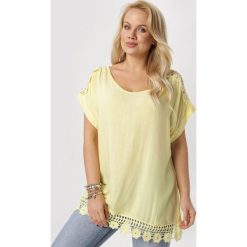 Żółta Bluzka Eviphite. Żółte bluzki damskie Born2be, xl, bez wzorów, bez kołnierzyka, bez rękawów. W wyprzedaży za 39,99 zł.
