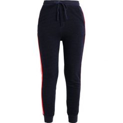 Spodnie dresowe damskie: Sundry SIDE STRIPES Spodnie treningowe navy