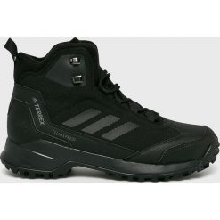 Adidas Performance - Buty Terrex Heron Mid. Czarne buty trekkingowe męskie marki adidas Performance, z materiału, na sznurówki, outdoorowe, primaloft. Za 599,90 zł.