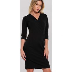 Czarna Sukienka Twelvemonth. Czarne sukienki damskie other, xl, bez wzorów, bez kołnierzyka, bez rękawów, mini. Za 79,99 zł.