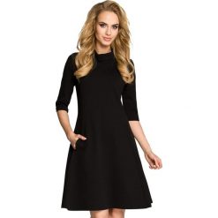 Rachele sukienka z golfem - czarna. Czarne sukienki damskie Moe, s, bez wzorów, z bawełny, eleganckie, z golfem, bez rękawów. Za 159,00 zł.