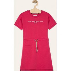 Tommy Hilfiger - Sukienka dziecięca 128-176 cm. Różowe sukienki dziewczęce TOMMY HILFIGER, z aplikacjami, z bawełny, z krótkim rękawem, krótkie, mini, rozkloszowane. Za 299,90 zł.