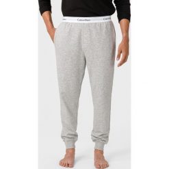 Calvin Klein Spodnie dresowe Szary. Szare spodnie męskie Calvin Klein, xl, bez wzorów, z bawełny. Za 307,95 zł.