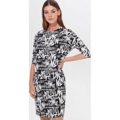 Wzorzysta sukienka Eco Aware - Czarny. Czarne sukienki damskie Mohito, s. Za 99,99 zł.