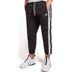 REEBOK MEET YOU THERE > DY7769. Spodnie męskie Reebok, xl, bez wzorów, z nylonu, street. Za 189,99 zł.